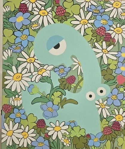 Pure Temptations: A mint green Yoodle among daisies, clover and forget-me-nots